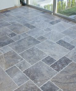 Light grey grout with silver french pattern travertine